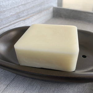 image of natural conditioner bar in sandalwood lime scent, by pickle and bee natural products, unwrapped